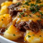 Slow Cooker Steak and Cheddar Potato Casserole