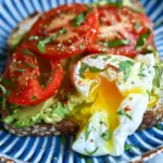 Breakfast Smashed Avocado Tomato Toast with Fried Poached Egg